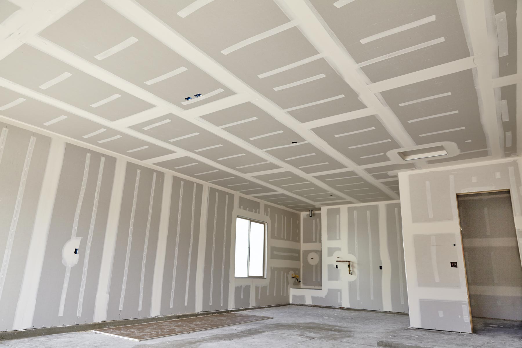room-with-tape-mud-drywall-ready-for-finishing